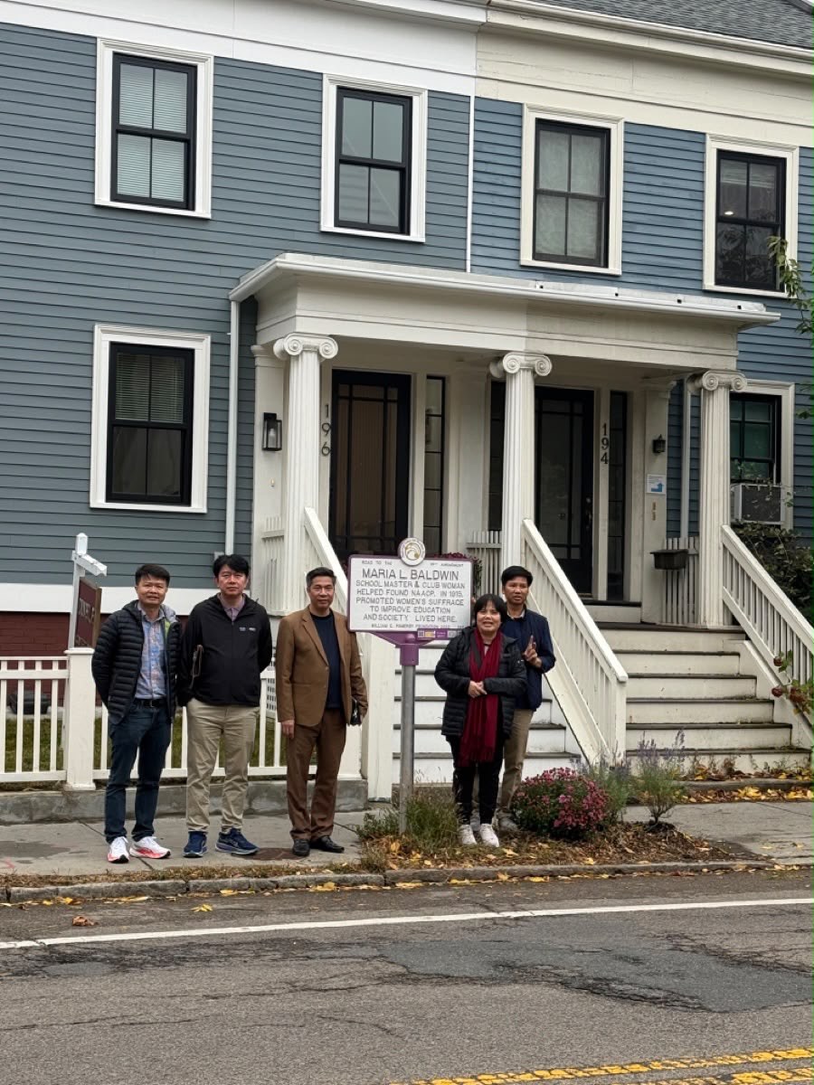 DinhLe Cambridge welcomes the visiting group — October 2026 visit